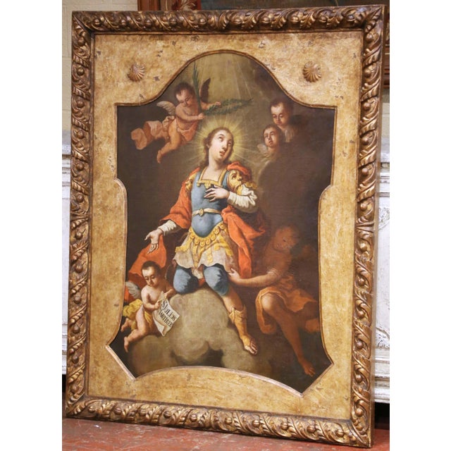 This important antique devotional painting depicts Saint Julius the Martyr surrounded by angels and the traditional...