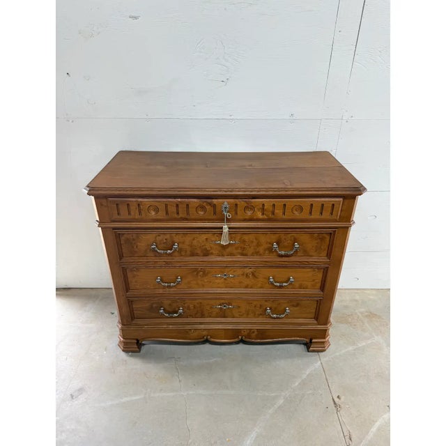 19th Century French Louis Philippe Commode from South France. Made of burl walnut, the wood has been finished with a...