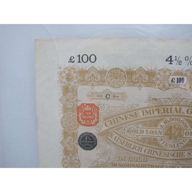 Collectible Chinese Imperial Government 4 1/2% Gold Loan Bond from 1898, specifically a £100 Sterling bond issued in...