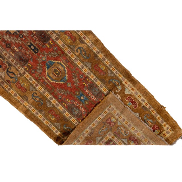 Experience the timeless elegance of a 1990s Vintage Bakshaeish hand-knotted wool rug. This runner is part of our Revival...