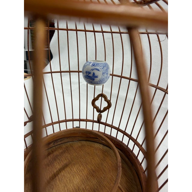 The art of Chinese Bamboo bird cage weaving is a staple in the Kala Village. Every home has an artist. Detailed carvings...