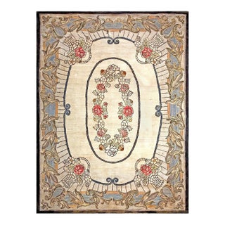 Amazing Ivory Ground Color Wiht Flower Details in the Center in a Medallion/Crest Design American Hooked Rug For Sale