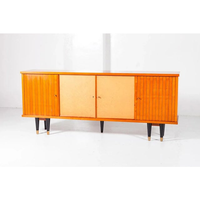 This large one of a kind credenza was made in a workshop in France or Belgium in the late 1940s. It features double...