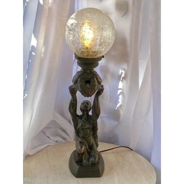 Antique c.1920 Art Deco Joan of Arc Spelter Lamp with Original Blown Crackle Glass Shade. Rare single family owner; this...