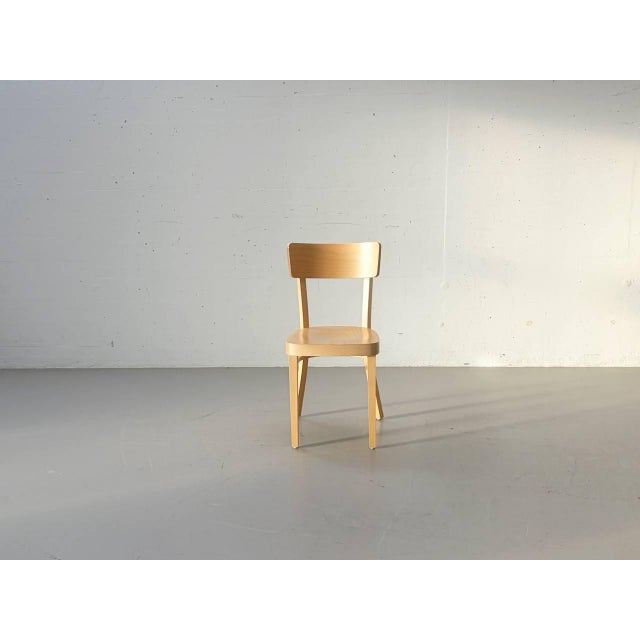 A timeless dining chair from the czech manufacturer ton, featuring a clean, functional design and high-quality...