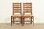 A gorgeous pair of English Country or Rustic European style ladder back dining chairs In the manner of Baker Furniture...