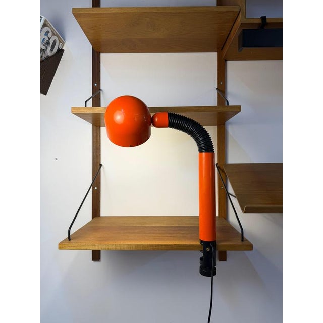 A striking statement of 70s design: this danish clamp lamp in the iconic space-age style brings dynamic lines and a...