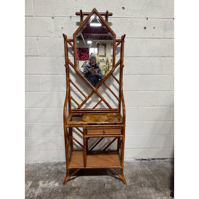 While there is no Maitland Smith label, it is very similiar. Super quality. Leather wrapped joint, burl surface area with...