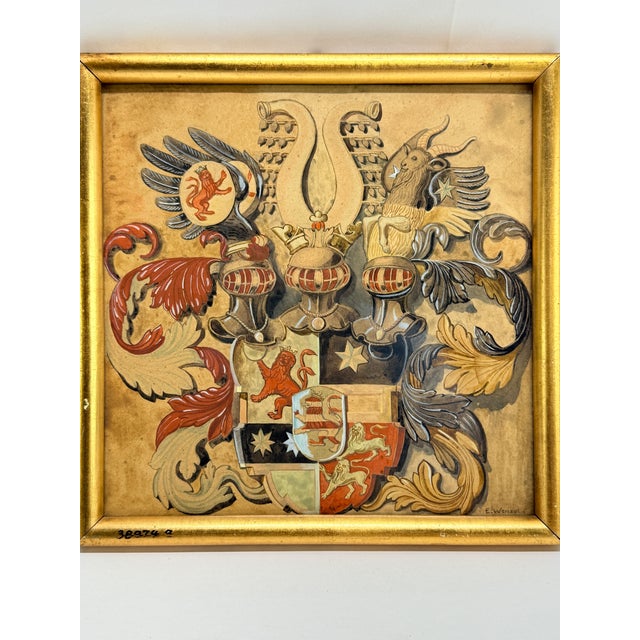 A finely rendered heraldic watercolor on paper depicting an elaborate composite coat of arms, signed lower right “E....