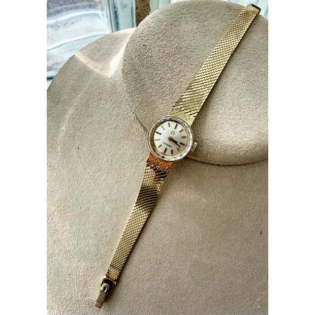 Rare Vintage 14 Karat Gold Ladies Omega Dress Wristwatch, Circa 1968 With Manual Wind-Up & Woven Gold Mesh Band by Premier Swiss Maker Omega For Sale - Image 10 of 12