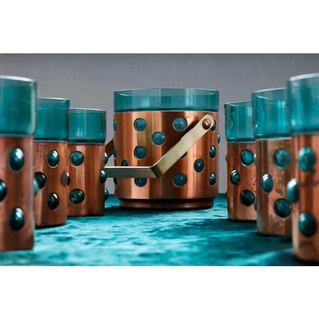 A very rare set of 6 drinking glasses and an ice bucket by Finnish designer Nanny Still for Raak Amsterdam. The...