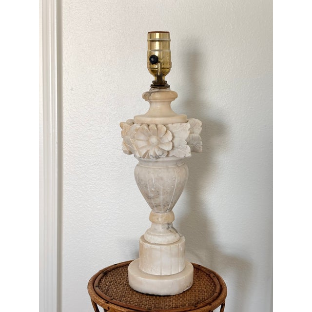 Lovely neoclassical urn-form lamp that has been hand-carved from Italian alabaster with grey veining that gives off a soft...