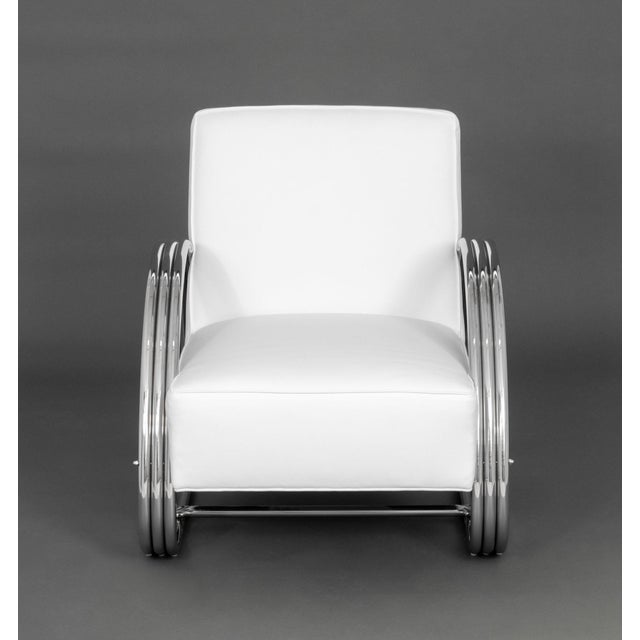 Ralph Lauren "Hudson Street" Lounge Chair, with white leather upholstery and polished stainless steel frame, "E.J. Victor,...