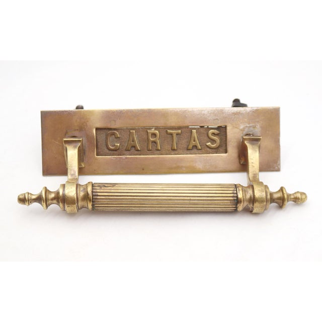 This piece has a grab handle for pulling a heavy entry door alongside a built-in spring loaded mail slot. The embossed...