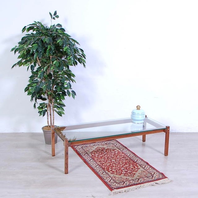 60s design table, Italian production. Wooden structure with glass top. Used table, you can see the signs of wear and time....