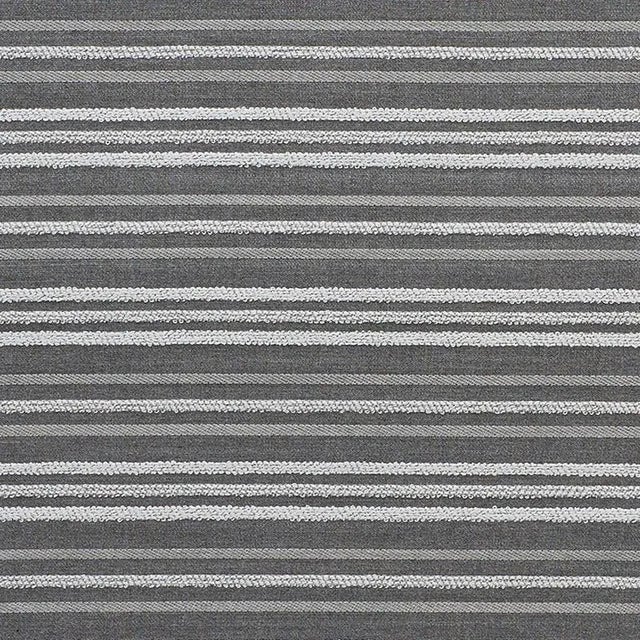 This miraculous indoor/outdoor stripe features raised, multi-textured bands on a flatweave ground. Boucle yarns give it...
