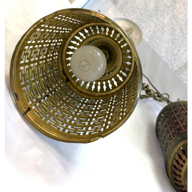 1900's Middle Eastern Hammered & Pierced Brass Swag Electrified Lanterns With Red Liner- A Pair For Sale - Image 17 of 18