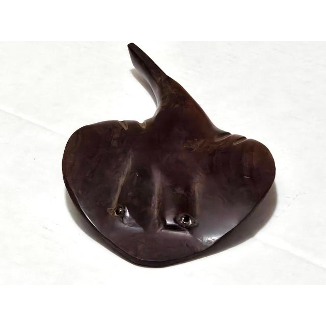 Offered is a hand carved Mexican Iron Wood Manta Ray figurine. Made from Desert Iron wood (palo fierro in Spanish), a very...