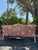 A beautiful vintage Mark Hampton for Hickory Chair camelback sofa featuring elegant floral upholstery, a beautifully...