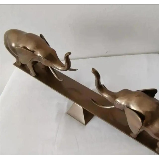 For Your Consideration. . . An extremely rare vintage DOLBI CASHIER brass sculpture of two elephants. This fabulous...