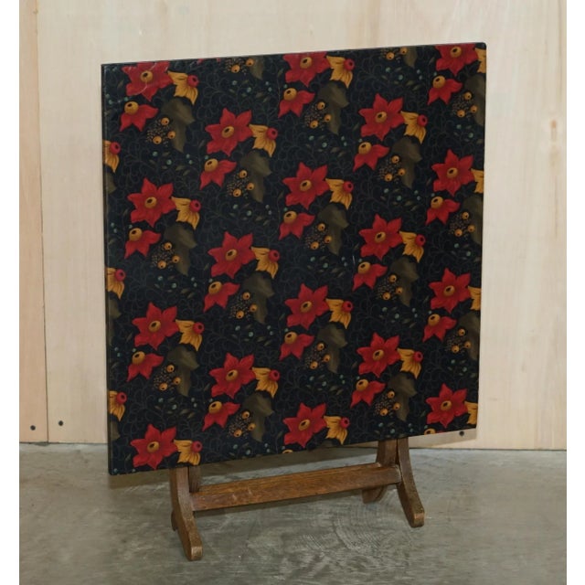 We are delighted to offer for sale this pair of lovely Mid Century Modern pine folding tables with floral covered tops A...