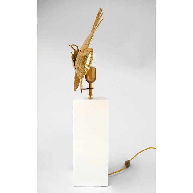 This lamp features a gilt brass sculpture of a scorpion fish and a square base. It was designed in the 1950s. European...