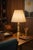 This vintage Stiffel table lamp offers a timeless sense of balance and warmth, designed to anchor a room with quiet...