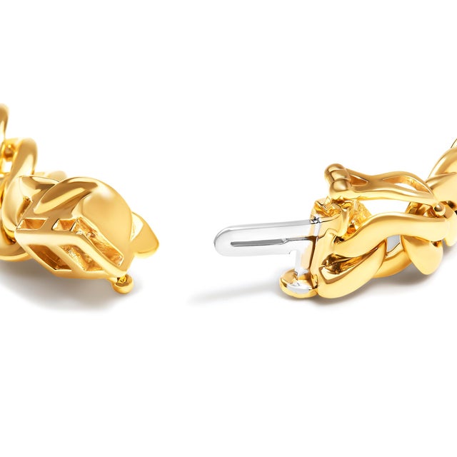 Encapsulate timeless elegance and spiritual symbolism with this exquisite 14K yellow gold-plated .925 sterling silver...