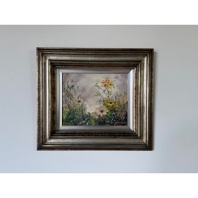Charming vintage floral still life oil painting on masonite board, featuring expressive brushwork and soft, natural tones....