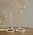 A beautifully simple and elegant set of vintage glass tube bud vases, designed for showcasing single stems or delicate...