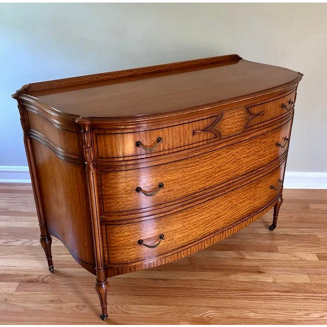 Beautiful curved front dresser made by the Widdicomb furniture company. Three drawers.