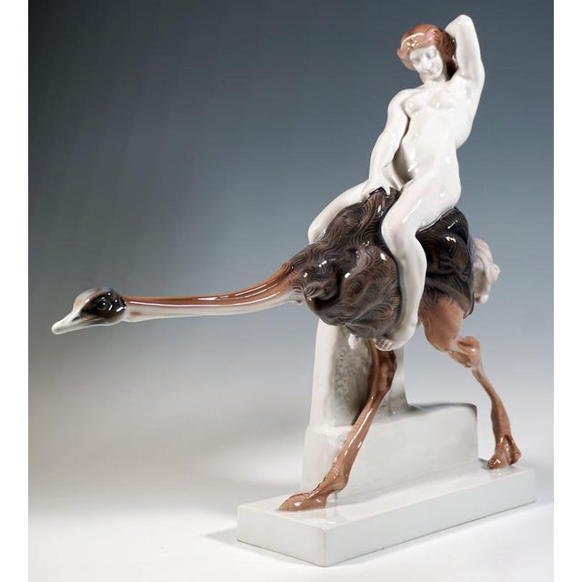 Admirable art nouveau figurine group by rosenthal: young, naked woman with her hair artfully tied up sitting astride on an...