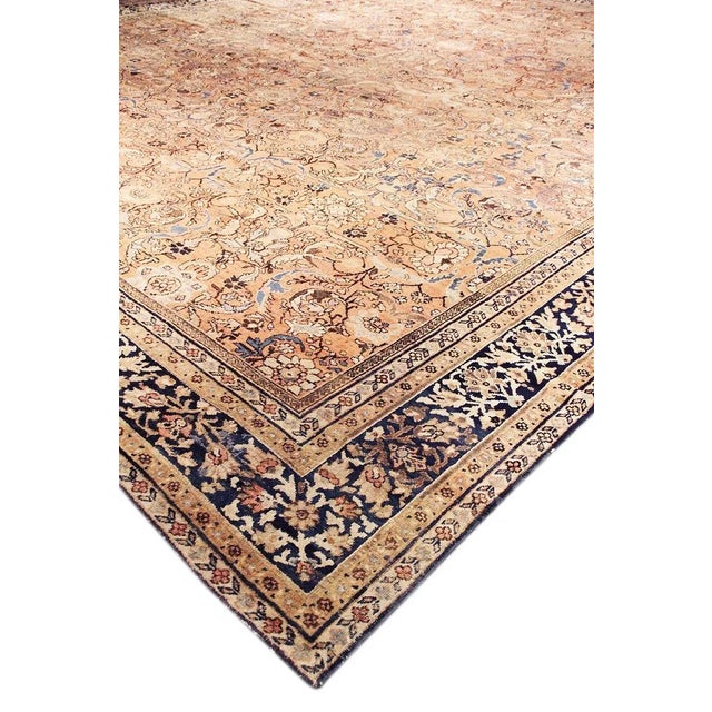 Antique Mahal wool rug with intricate floral motifs throughout with complementary border. This gorgeous antique area rug...