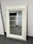 Design Plus Gallery presents the Savanna Mirror from Moe's Home. This rectangular mirror has a wide white beveled frame...