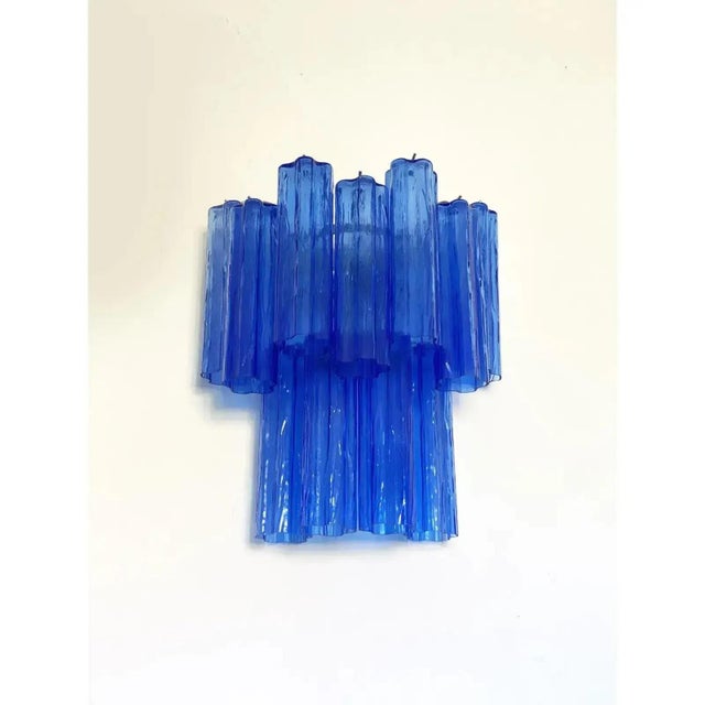 Blue tronchi wall sconce by simoeng, in exhibition piece conditions. Designed from 2000 us plug (up to 110v). dimensions...