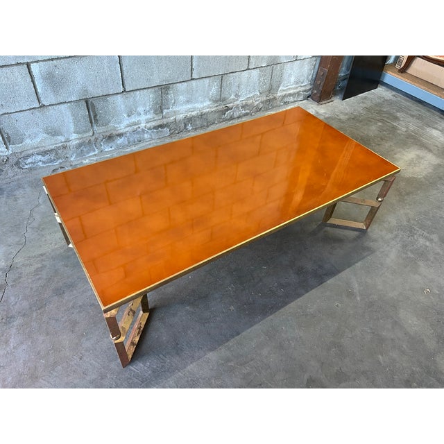 Exceptional 1970s coffee table designed by Guy Lefèvre for Maison Jansen, stamped “Jansen Paris” to the frame. This highly...