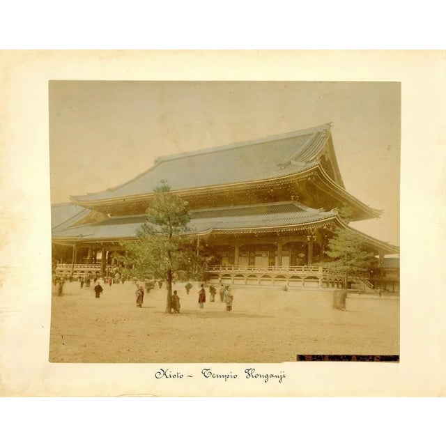 View of Honganji Temple in Kyoto is an hand-inked Albumen print with aniline applied on hardcover. Very good conditions....