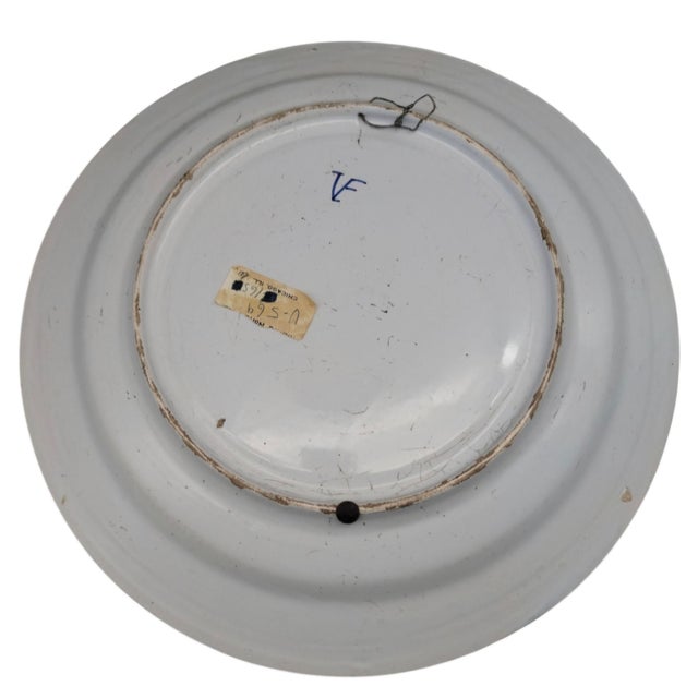 Vibrant antique French faience (Delft-style) tin-glazed earthenware charger featuring a beautifully hand-painted...