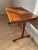 This small vintage teak sewing table impresses with its beautiful, vibrant wood grain and a flawless, original basket....