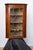 A wall mounted corner cabinet, late 18th century, English, attributed to Thomas Chippendale. Made from mahogany and...
