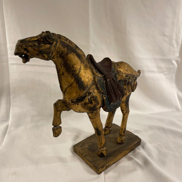 A very nice hand carved Giltwood Tang Dynasty, Chinese horse statue.