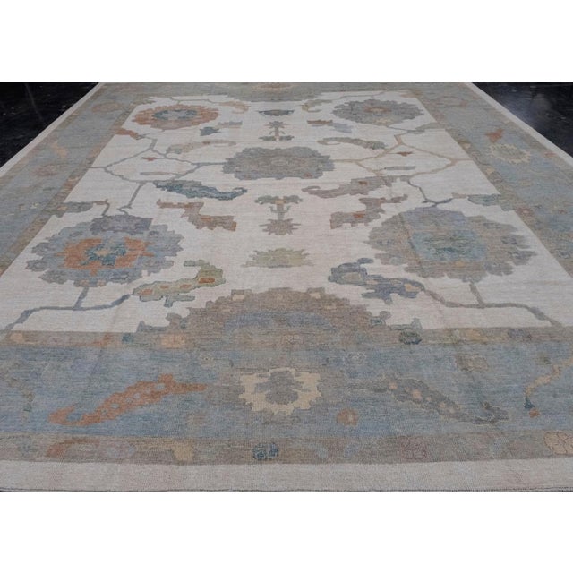 13'10" x 16' Made from 100% high-quality wool, this Pile-Knotted rug is dyed with natural vegetable colors. It reflects...