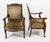 This is an elegant antique pair of french empire revival upholstered back mahogany armchair fauteuils, circa 1880 in date....