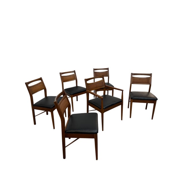 Elevate your dining space with this set of six Mid-Century Modern American of Martinsville “Accord” dining chairs, circa...