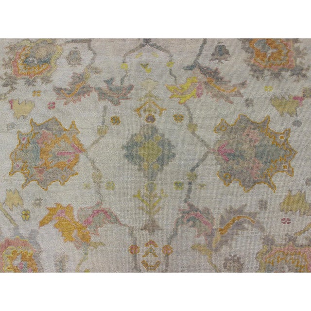 Cream Turkish Oushak Rug With Muted Color Palette and All-Over Flower Design For Sale - Image 8 of 12