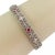 This lovely Art Deco bracelet is crafted form 18k white gold with a beautiful milgrain and filigree design. It is 10.5mm...