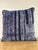 Decorative pillow made from an antique indigo-dyed textile, showcasing bold vertical striping and intricate geometric...