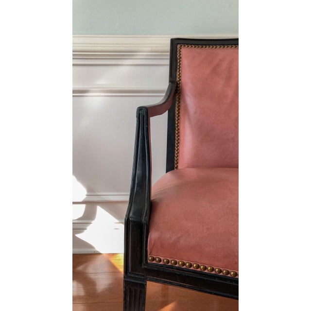 A Pair of French Art Deco Leather Lounge Chairs Attributed to Jules Leleu. These fabulous lounge chairs retain their...