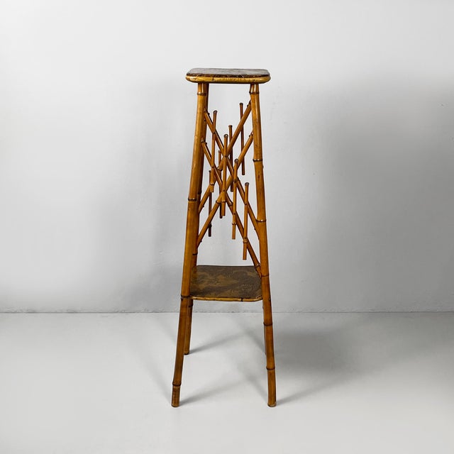 Italian Art Nouveau style pedestal in brown leather and bamboo, 1930s Pedestal with two square tops, covered in brown...