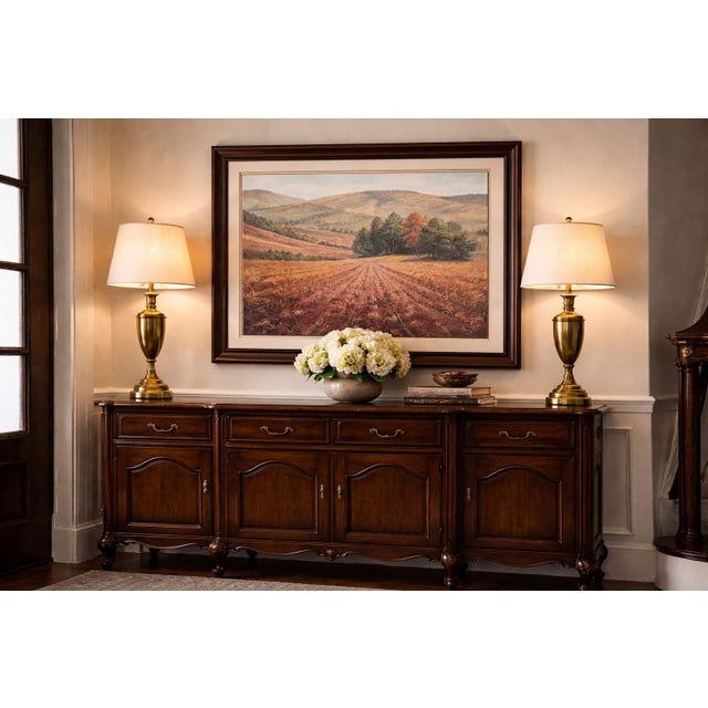 A beautifully rendered signed watercolor landscape by Henderson, S.W.A. (Society of Women Artists), capturing a sweeping...